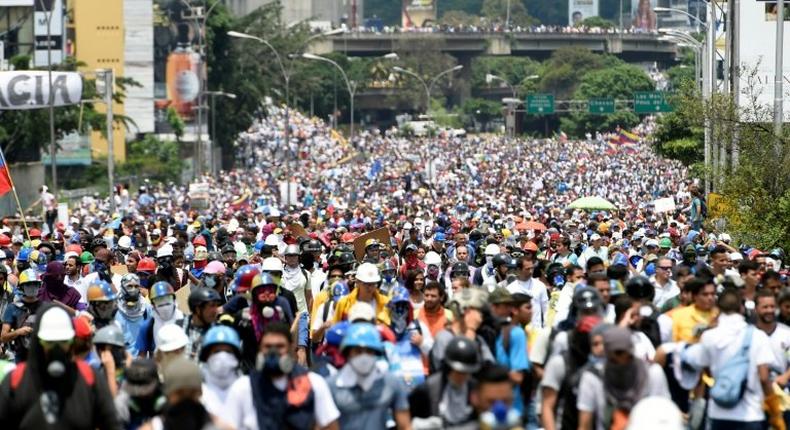 Oppositon activists march along Francisco Fajardo highway, during a protest against President Nicolas Maduro in Caracas, on May 10, 2017