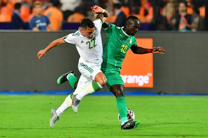 Liverpool star Sadio Mane (R) was among the scorers for Senegal in a convincing World Cup qualifying victory over Namibia