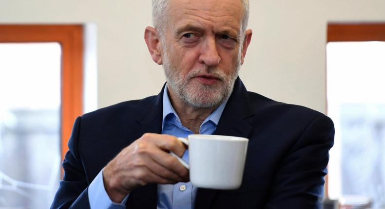 Labour leader Jeremy Corbyn gestures, during a visit to discuss cuts to bus services, in Derbyshire, England, Thursday, Jan. 31, 2019. Bus fares are set to