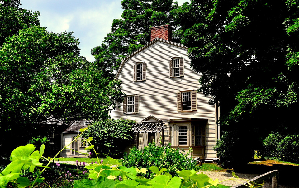 Concord, Massachusetts - July 9, 2013: 1770 Olde Manse and gardens in Minuteman National Historic Park, former home of noted American authors Ralph Waldo Emerson and Nathaniel Hawthorne *