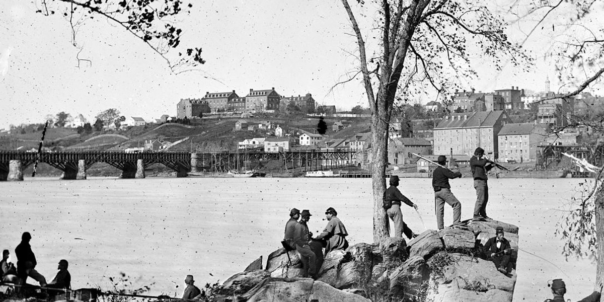 Union soldiers across the Potomac River from Georgetown University in 1861.