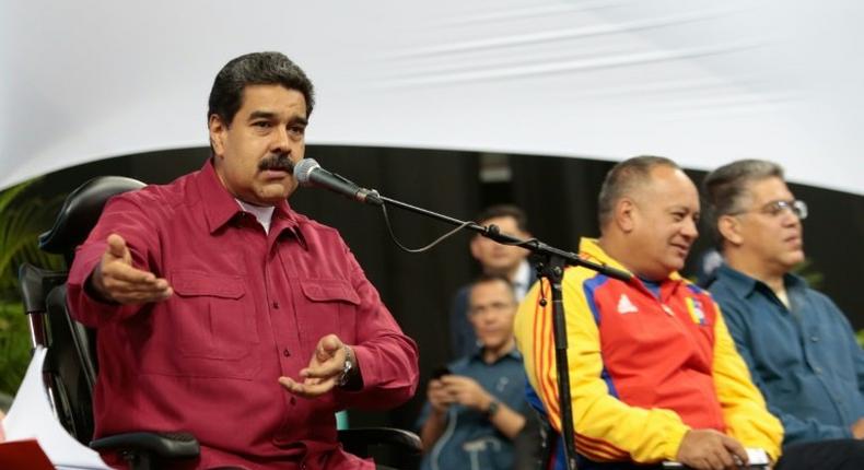 Venezuelan President Nicolas Maduro (L), shown in Caracas this week in this picture handed out by his office, rescheduled the inauguration of his controversial Constituent Assembly for Friday