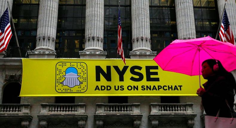 A Snapchat sign hangs on the facade of the New York Stock Exchange (NYSE) in New York City.