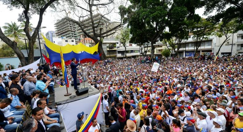 Supporters of Venezuelan opposition leader and self-proclaimed interim president Juan Guaido take part in a meeting at Chacao neighbourhood in Caracas on April 19, 2019