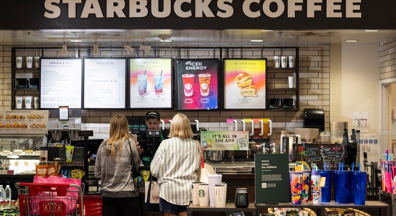 Comparable sales are down in Starbucks' two biggest markets.Etienne Lauren/AFP via Getty Images