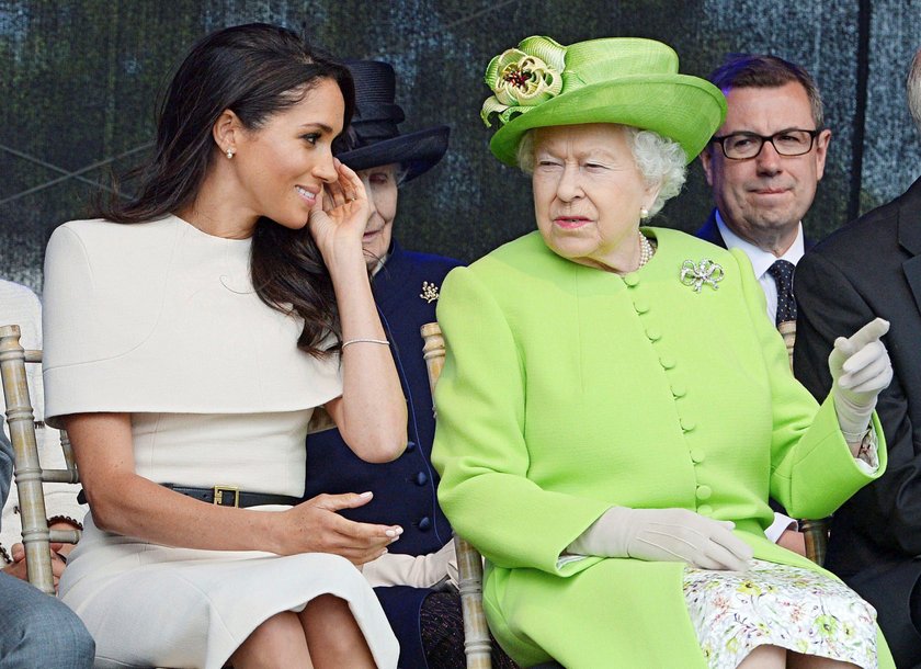 Britain's Queen Elizabeth and Meghan, the Duchess of Sussex, visit the Storyhouse in Chester