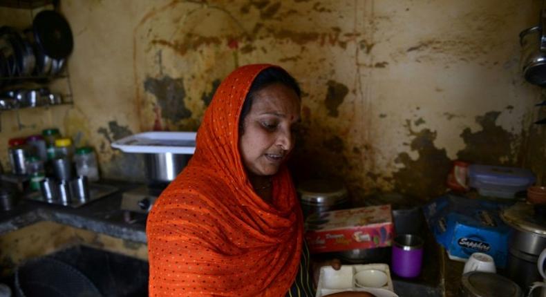 Kiran Rana, mother of one of 14 men arrested for lynching a Muslim villager in Uttar Pradesh, supports the state's new hardline Hindu head, recently appointed by Prime Minister Modi