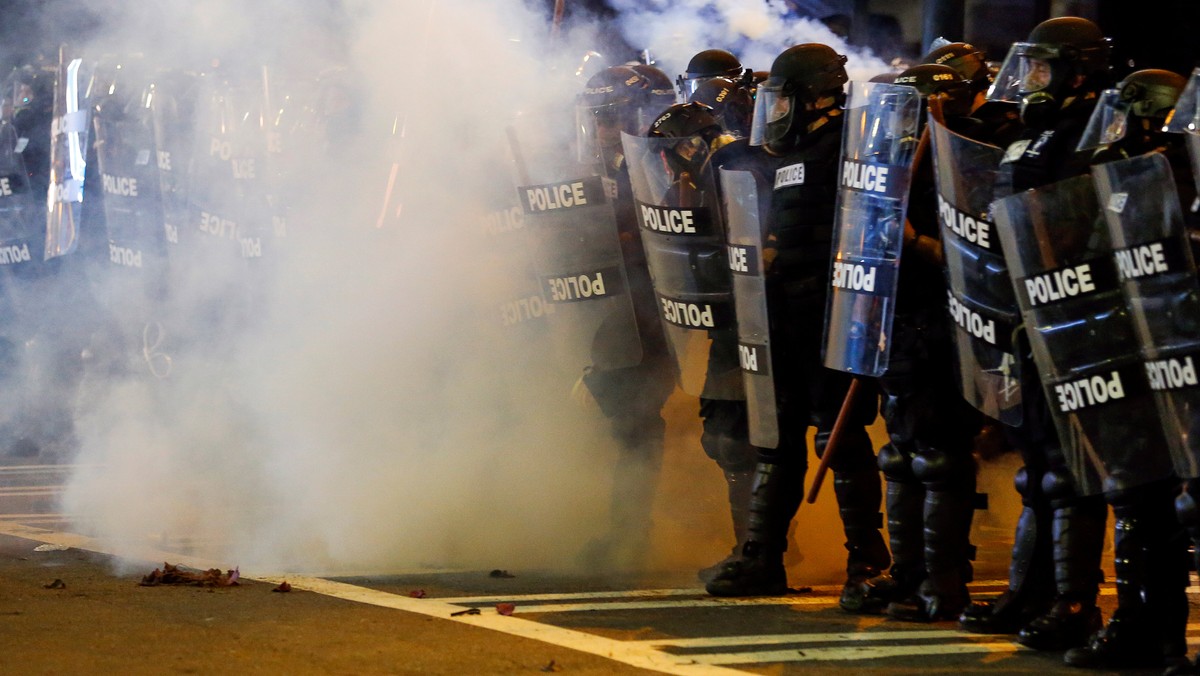 Police hold their lines in uptown Charlotte, NC during a protest of the police shooting of Keith Scott, in Charlotte