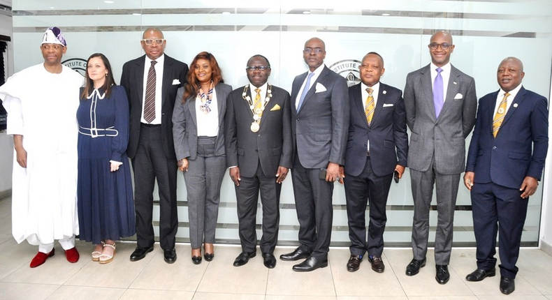 From left: Mr. Gboyega Balogun; his wife, Emma; Mr. Jide Balogun; Second Vice President, Chartered Institute of Stockbrokers (CIS), Mrs. Fiona Ahimie; President of CIS, Mr. Oluwole Adeosun; Mr. Bolaji Balogun; First Vice President, CIS, Mr. Oluropo Dada; Mr. Ladi Balogun and Registrar of CIS, Josiah Akerewusi, during a special Farewell Session organised in honour of late Otunba Subomi Balogun, Founder of FCMB Group, by the CIS in Lagos yesterday (July 3, 2023).