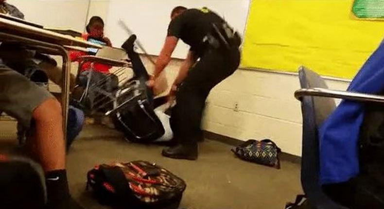 White police officer beating and assaulting black school girl goes viral