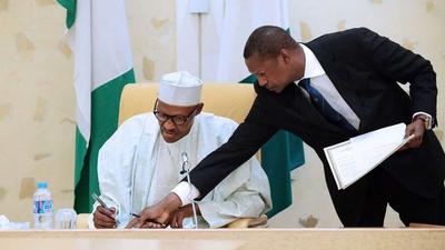 Nigerian Muhammadu Buhari and the Attorney General, Abubakar Malami