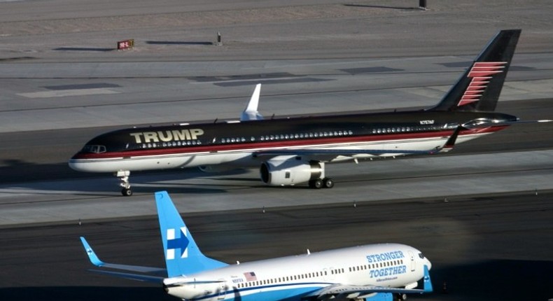 Republican presidential nominee Donald Trump's plane passes Democratic presidential nominee Hillary Clinton's campaign plane at McCarran International Airport, in Nevada, on October 18, 2016