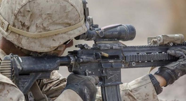 A US Marine fires a M27 infantry automatic rifle during an exercise at Twentynine Palms, California, Aug. 18, 2016