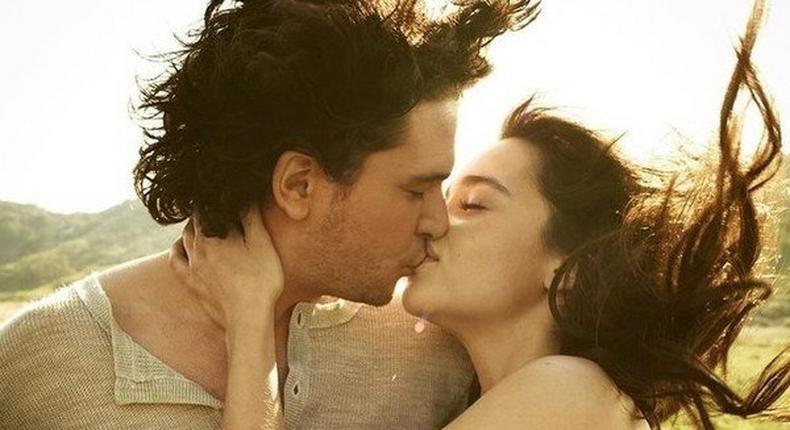 Kit Harrington and Emilia Clarke kiss during a photo shoot in 2012
