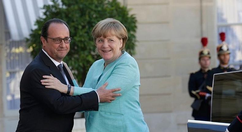 Socialist French president, Francois Hollande welcomes German Chancellor Angela Merkel