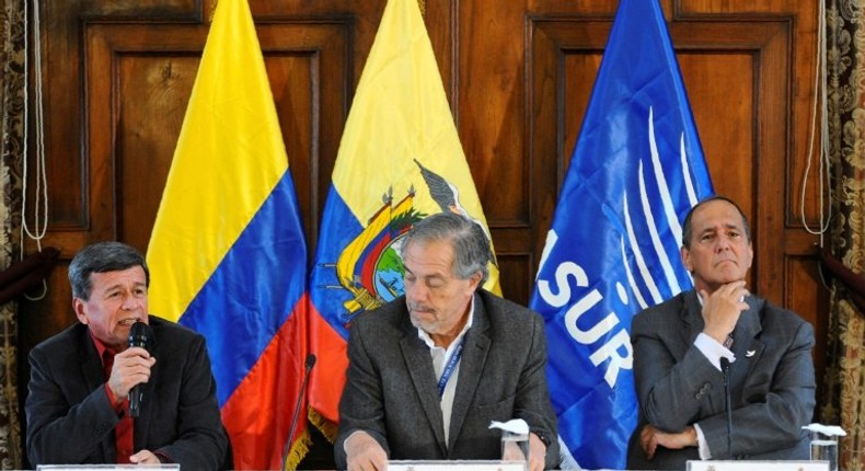 Colombia's ELN guerrilla member Pablo Beltran (L) speaks next to Ecuadorean government representative Juan Meriguet (C) and Colombia'a government representative Juan Camilo Restrepo, during a press conference in Quito on February 16, 2017