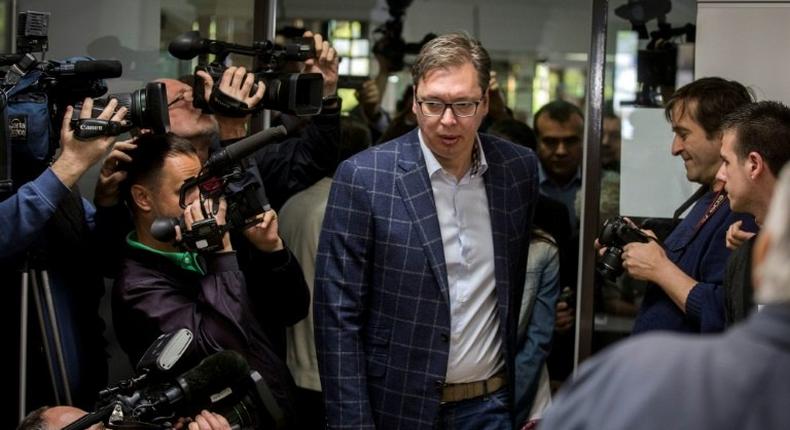 Presidential candidate and Serbian Prime Minister Aleksandar Vucic arrives at a polling station in Belgrade on April 2, 2017