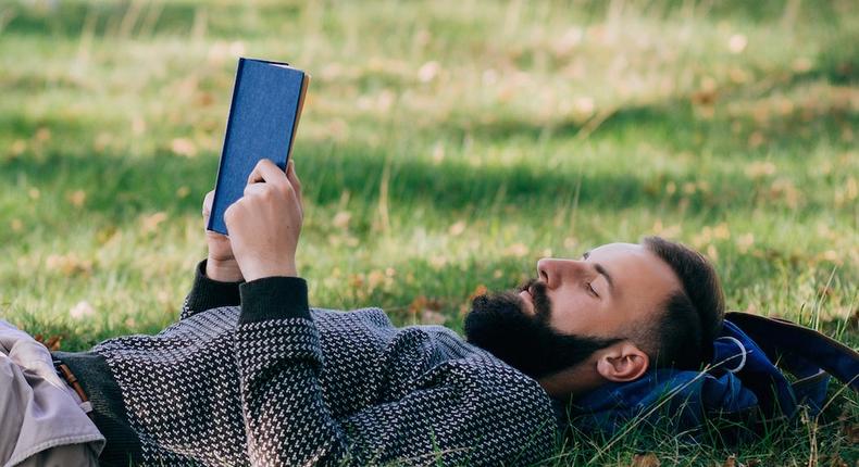 man reading outside