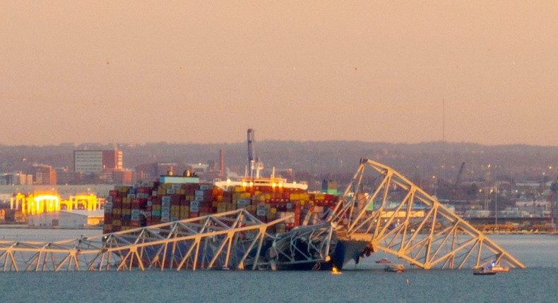 The remains of the bridge in Baltimore on Tuesday morning