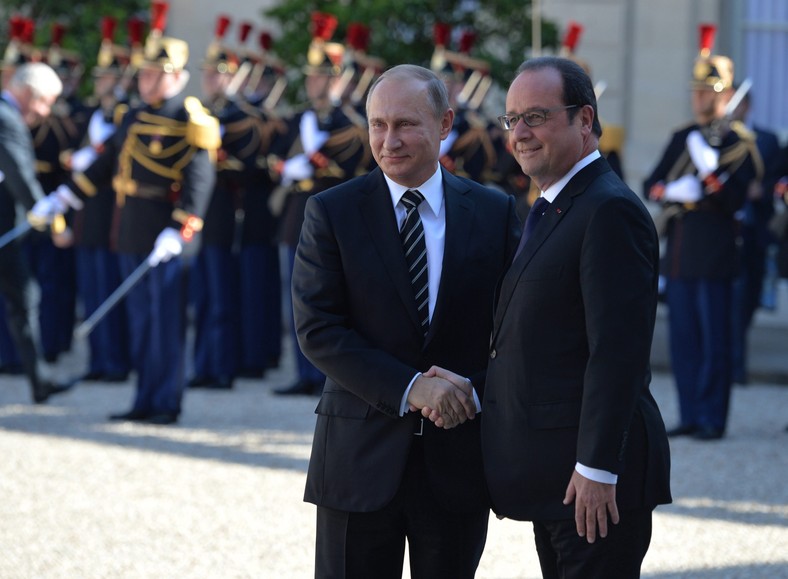 Władimir Putin i b. prezydent Francji Francois Hollande