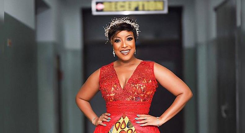 Ghanaian actress, Joselyn Dumas looking stunning in a beautiful dress and hair piece.