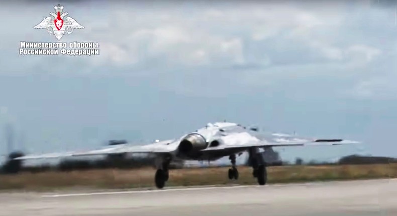 Russia's S-70 drone is seen taking off at an unidentified location in August 2019.Russian Defense Ministry Press Service via AP