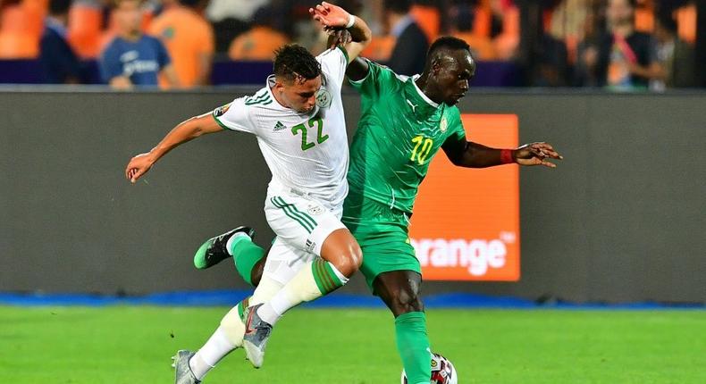 Liverpool star Sadio Mane (R) was among the scorers for Senegal in a convincing World Cup qualifying victory over Namibia on Saturday. Creator: Giuseppe CACACE