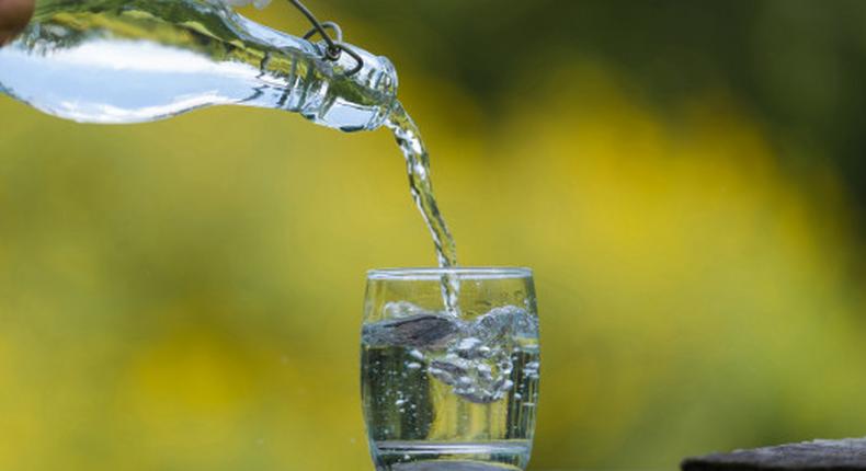 Pouring water in a glass