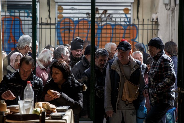 The Wider Image: Greeks slide deeper into poverty