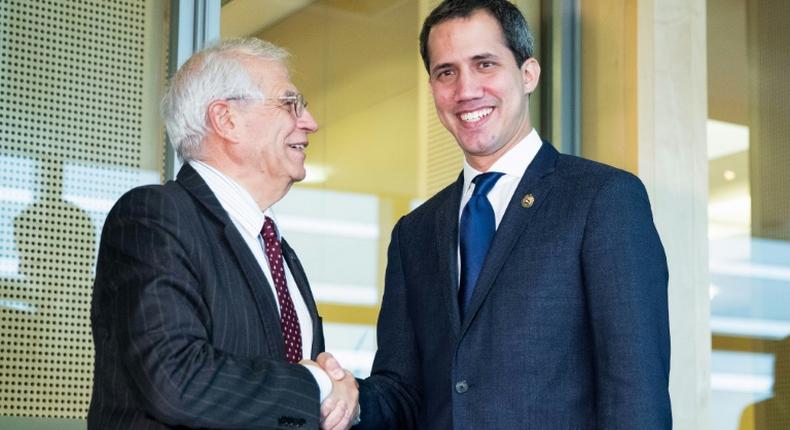 While there was no unanimous EU position on recognising Guaido, right, as Venezuela's interim leader, a European source said the meeting (between him and Borrell) is a message in itself