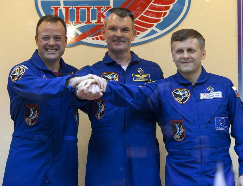 Kosmonaut Ron Garan (levo) s ruskim kolegama