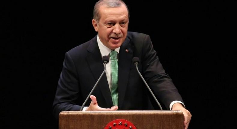 Turkish President Recep Tayyip Erdogan delivers a speech during the Living Human Treasures award ceremony at the Bestepe National Congress and Culture Centre in Ankara on November 3, 2016