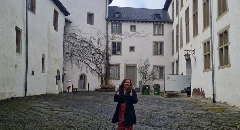 Mikhaila Friel is photographed outside Clervaux Castle in Luxembourg.Mikhaila Friel/Insider