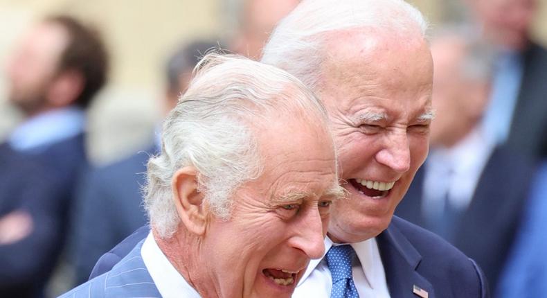 King Charles III and President Joe Biden laughing in the Quadrangle at Windsor Castle on July 10, 2023, in Windsor, England.Chris Jackson - WPA Pool/Getty Images