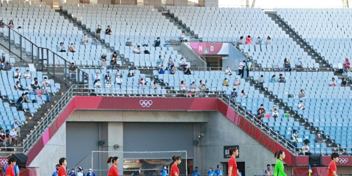 Here to cheer: lucky few allowed for Olympic football