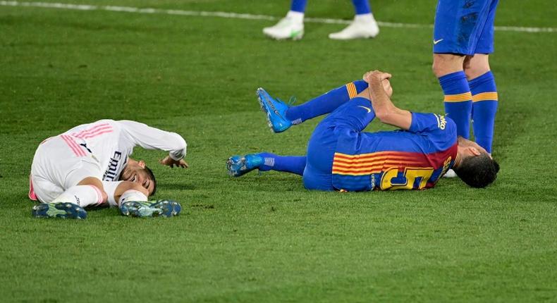 Lucas Vazquez (left) injured in Saturday's Clasico