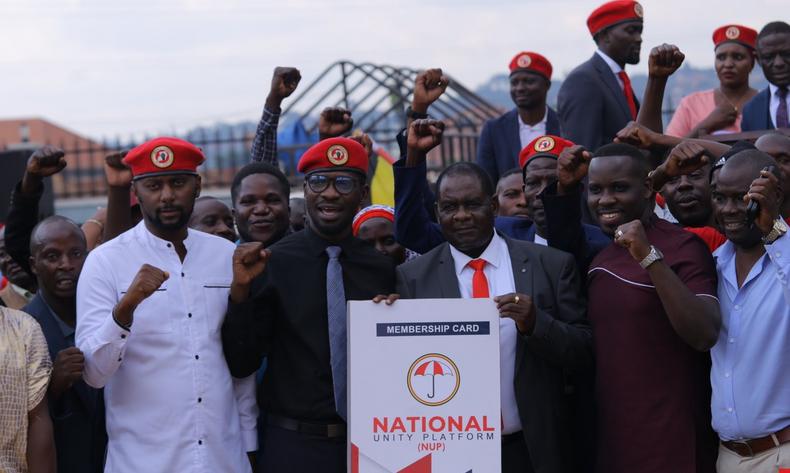 Bobi Wine poses with some of the NRM defectors