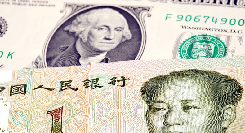 A top economist warns the US dollar will 'no longer be the dominant world currency' as trade in Chinese yuan rises.Getty Images