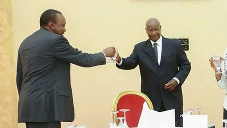 Image result for museveni and uhuru laughing