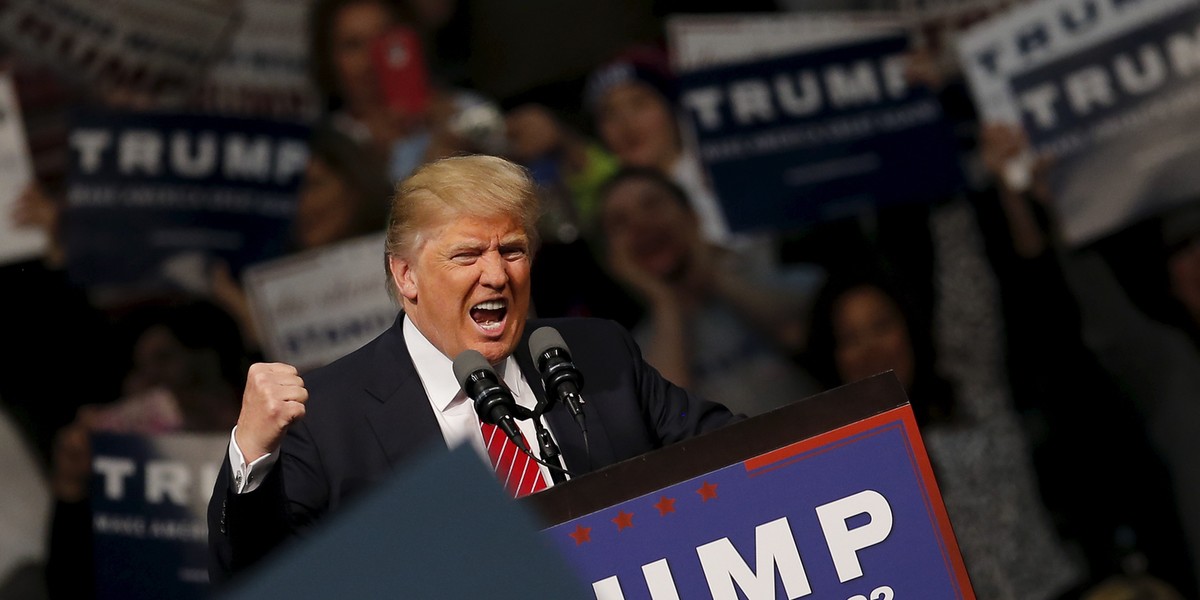 Republican US presidential candidate Donald Trump speaks to supporters during a campaign rally in Warren, Michigan, March 4, 2016.