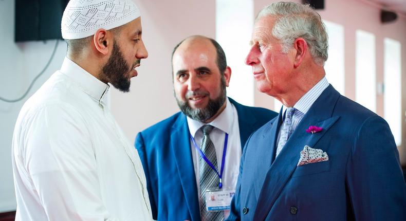 Britain's Prince Charles visits the Muslim Welfare House in Finsbury, near the scene of the Finsbury Mosque attack, and shakes hands with Imam Mohammed Mahmoud who protected the attacker after the incident, June 21, 2017.