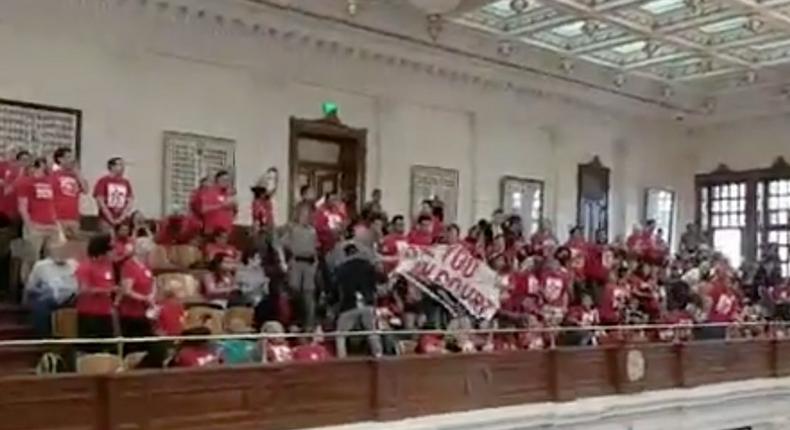 Protesters in the gallery of the Texas House on Monday.