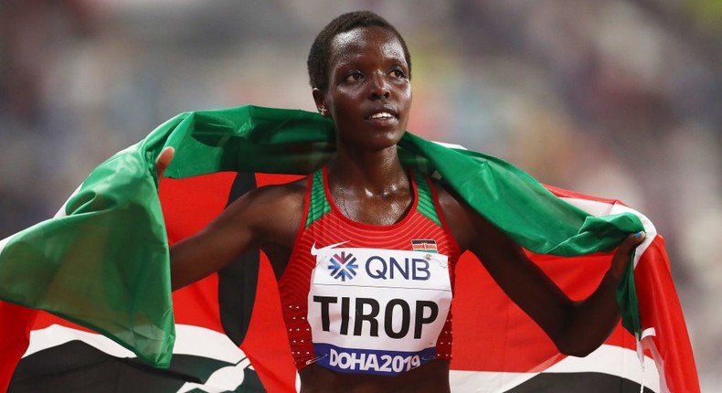 DOHA, QATAR - SEPTEMBER 28: Agnes Jebet Tirop of Kenya celebrates winning bronze in the Women's 10,000 Metres final during day two of 17th IAAF World Athletics Championships Doha 2019 at Khalifa International Stadium on September 28, 2019 in Doha, Qatar. (Photo by Alexander Hassenstein/Getty Images for IAAF)