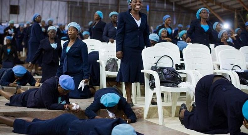 Women praying in a church