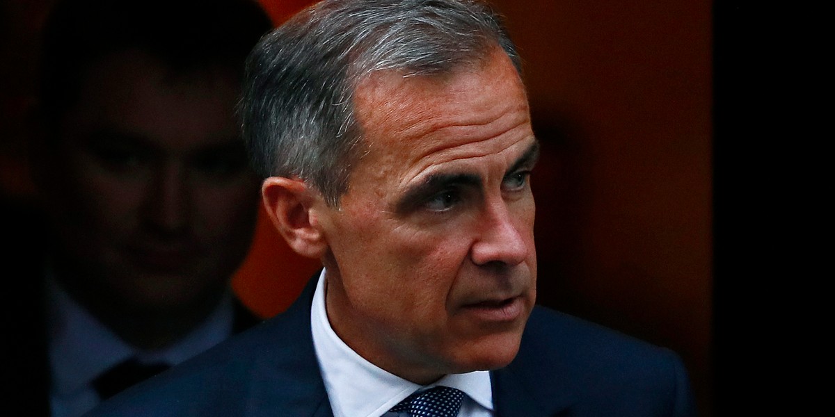 Bank of England holds, bumps up inflation forecasts