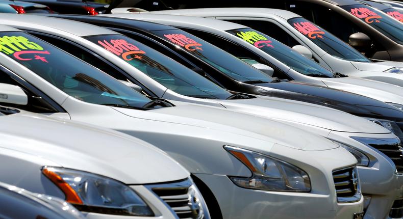 FILE PHOTO: Automobiles are shown for sale at a car dealership in Carlsbad, California