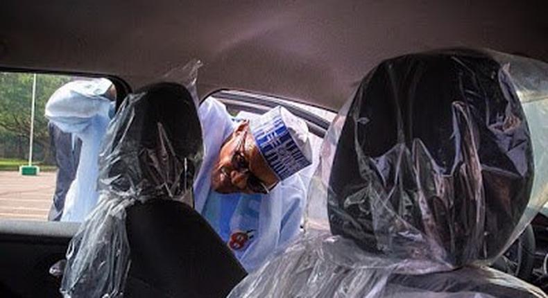 President Buhari inspecting ‘Made-In-Nigeria’ Peugeot car