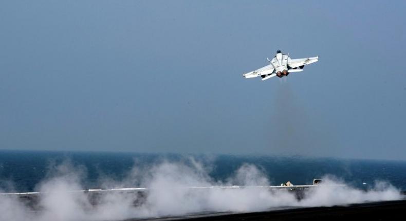 An American F/A-18E Super Hornet, like this one pictured in the region last October, shot down a Syrian regime warplane on Sunday evening