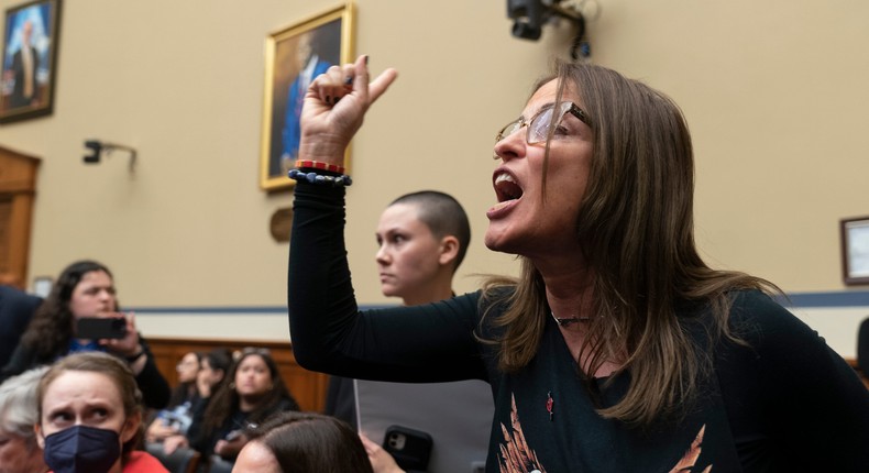 Patricia Oliver, the mother of Joaquin Oliver, one of the victims of the 2018 mass shooting at Marjory Stoneman Douglas High School in Parkland, Fla., is argues with lawmakers during a hearing recess on Capitol Hill in Washington, Thursday, March 23, 2023.AP Photo/Manuel Balce Ceneta