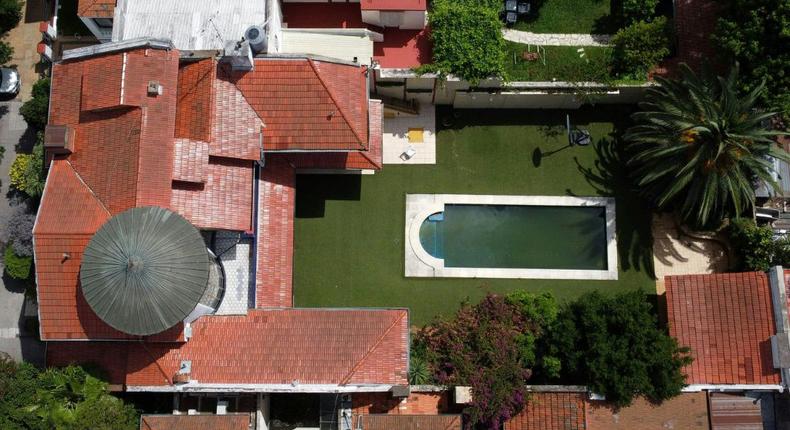 This house and swimming pool in Buenos Aires which football superstar Diego Maradona bought for his parents in 1980 failed to sell at a virtual auction of his assets on December 19, 2021 Creator: JUAN MABROMATA